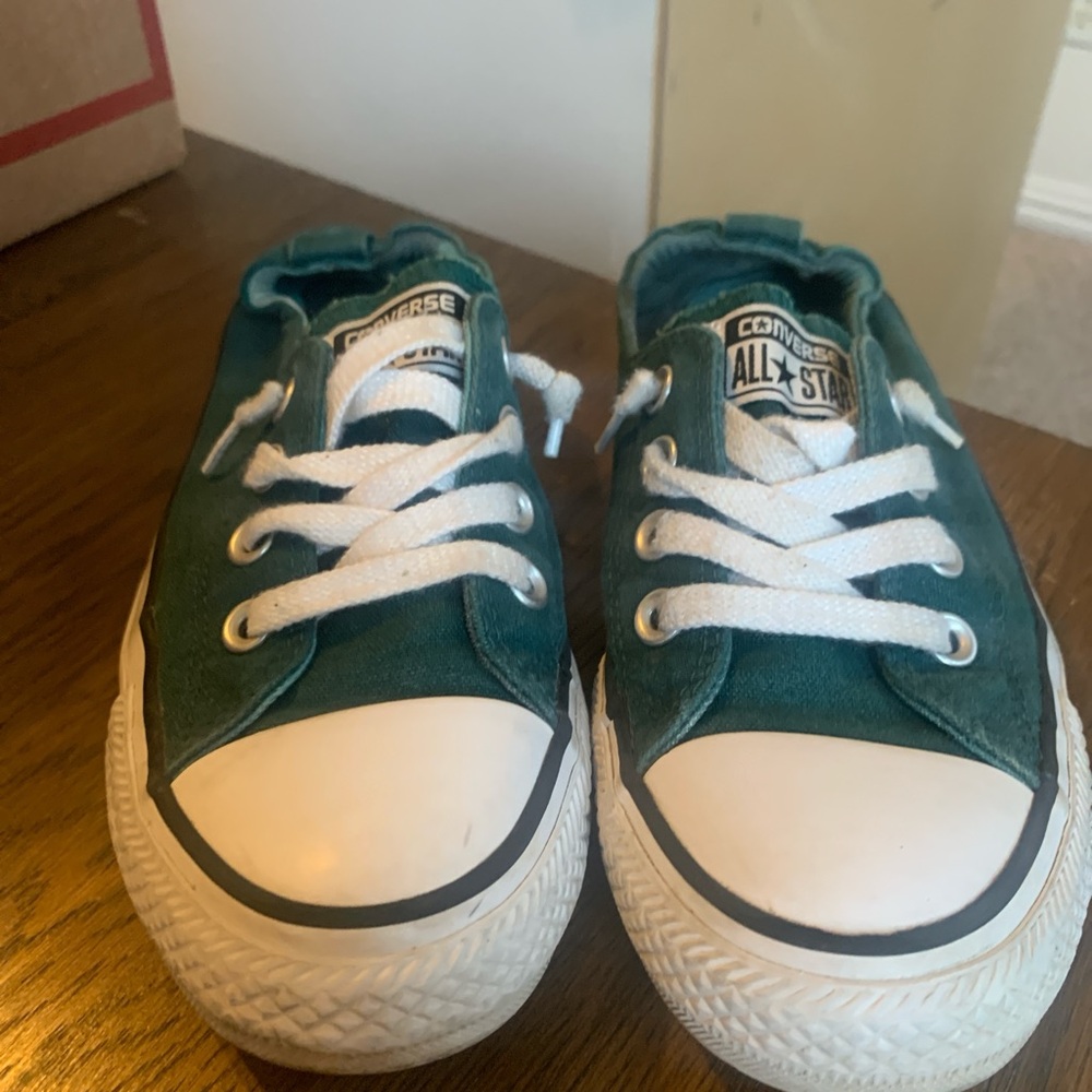 Green Converse slip -ons